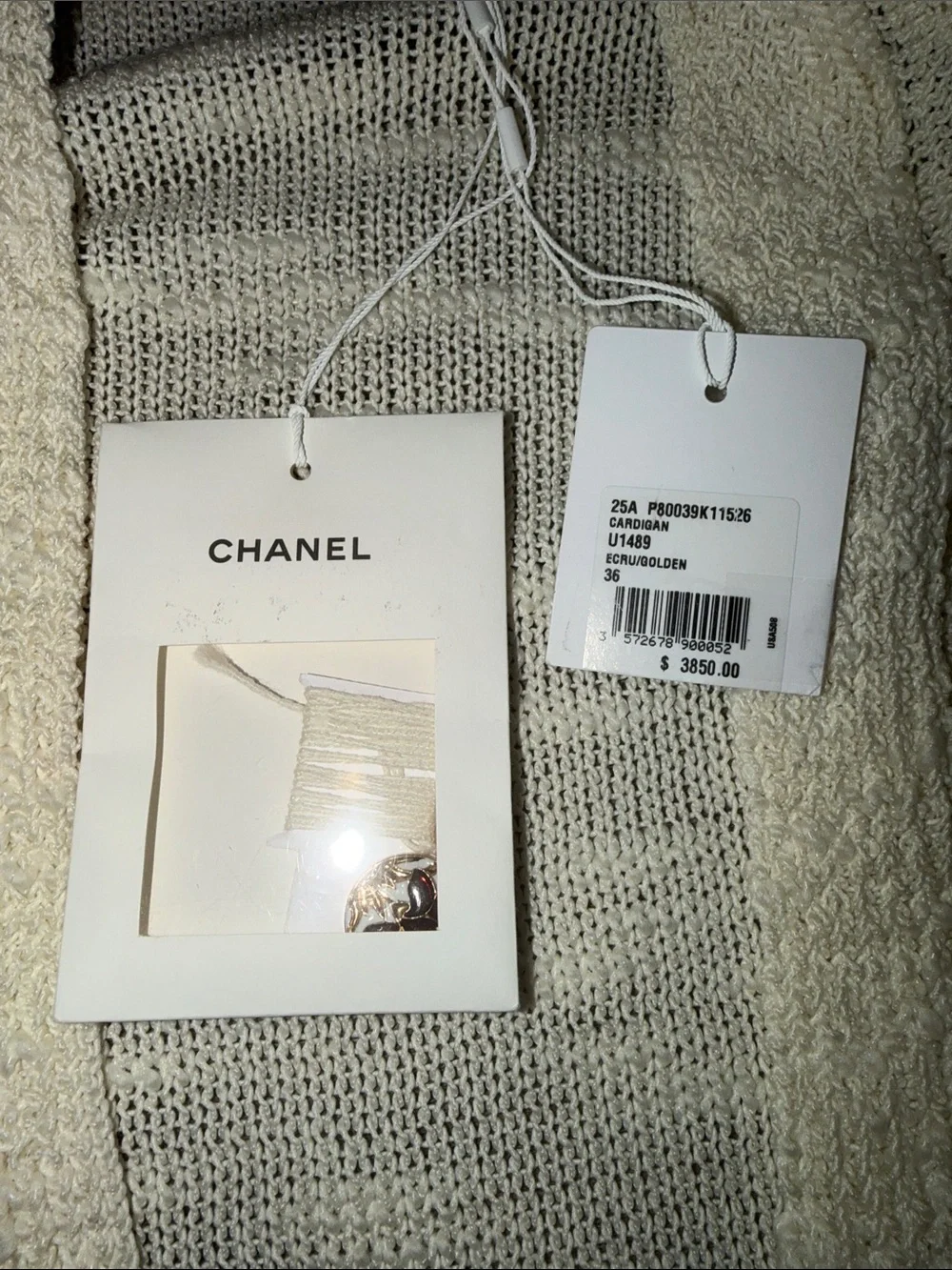 CHANEL Cream Knit Cardigan with Brown Trim and Decorative Buttons
